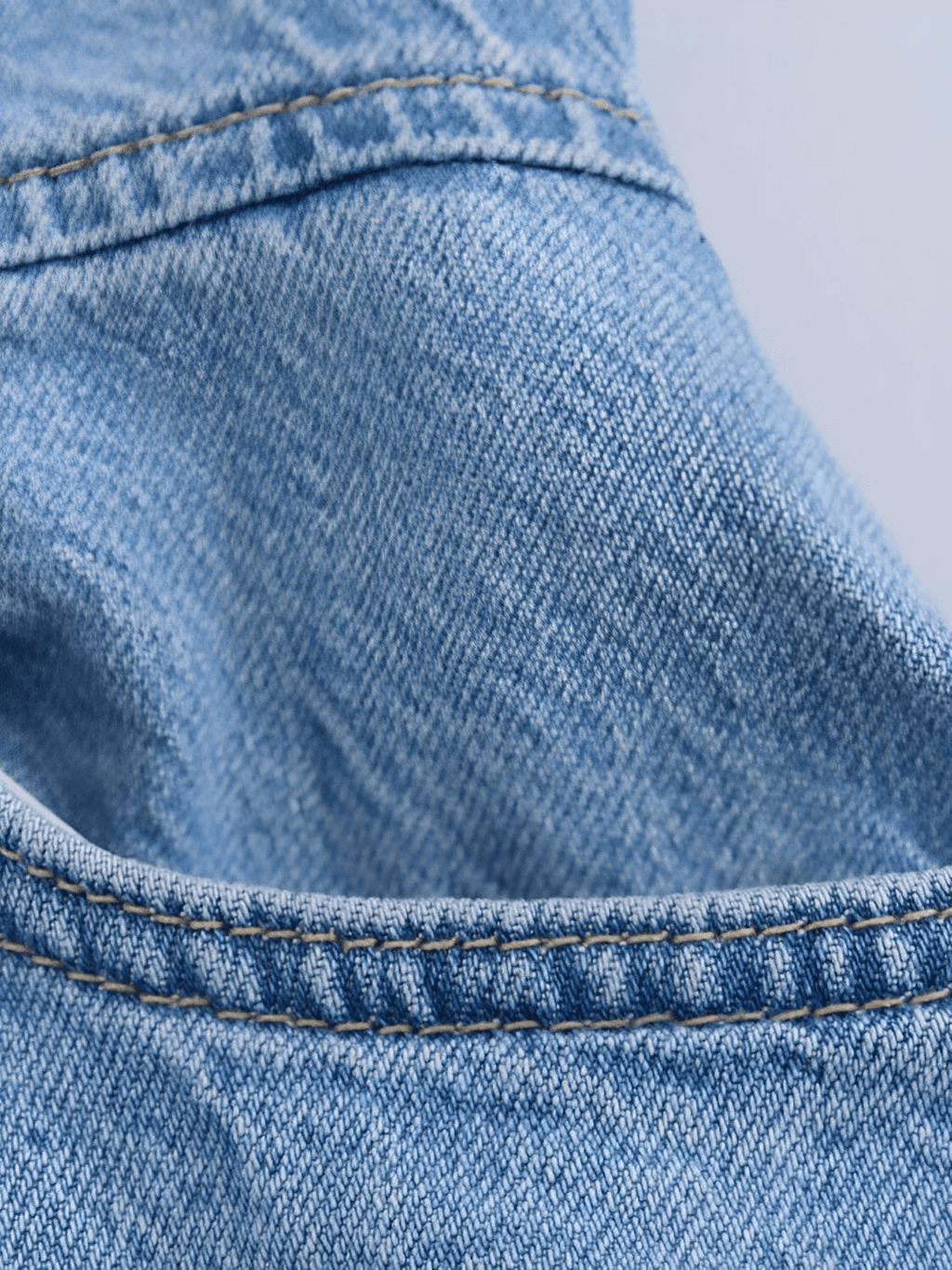 Macacão Jeans Pantalona com Decote Nadador e Bolsos - Jordana